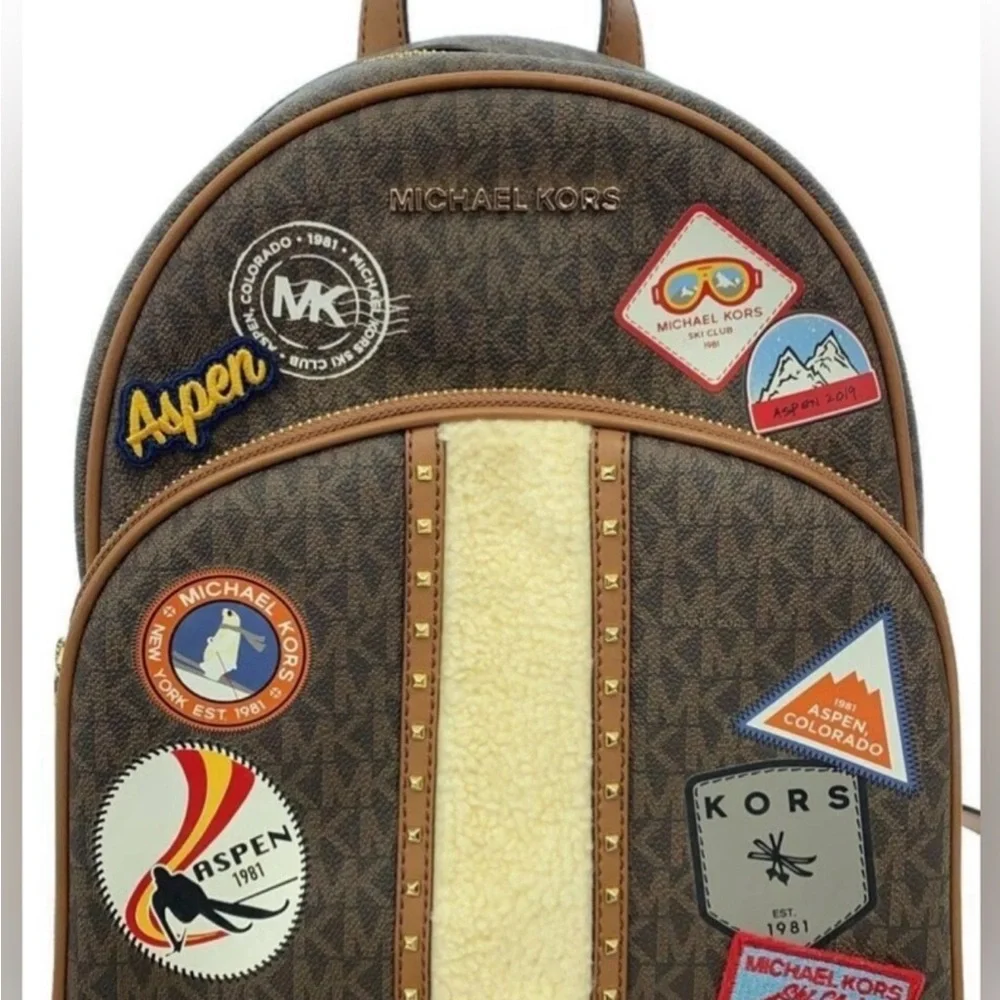 Michael Kors Brown Backpack with Aspen patches sherpa detail like new (RARE)